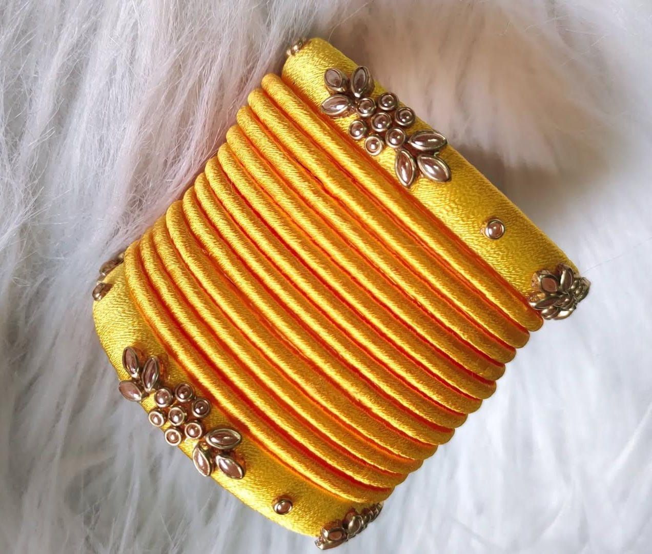Yellow Silk Thread Bangle Set with Stone and Pearl Embellishment