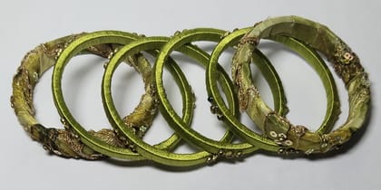 Green Silk Thread Bangle Set with Stone and Pearl Embellishment Green Silk Thread Bangle Set with Stone and Pearl Embellishment