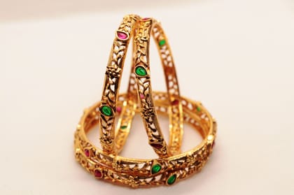 Gold Plated Filigree Work Bangle Set with Ruby and Emerald Stones Gold Plated Filigree Work Bangle Set with Ruby and Emerald Stones