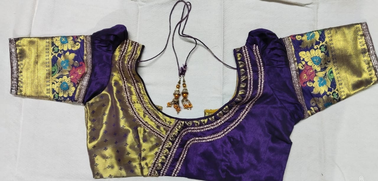 Purple and gold silk embroidered traditional Indian choli blouse with mirror work and gota patti