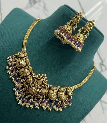 Gold-plated antique finish necklace set with purple stones and pearls