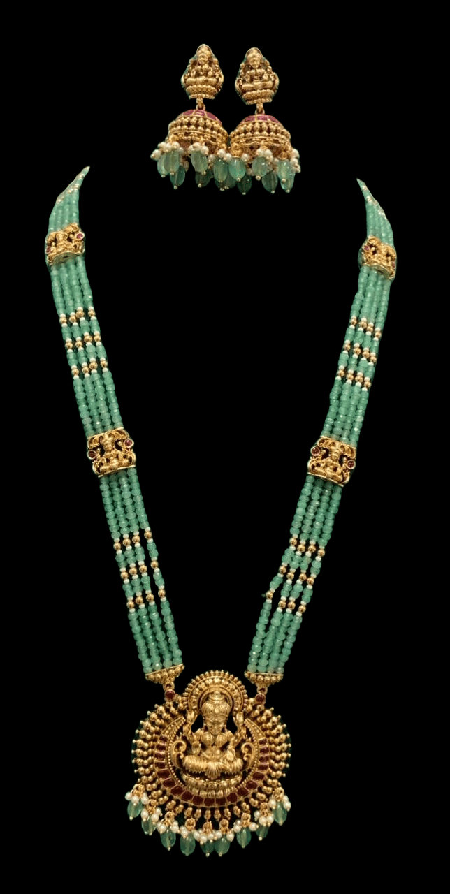 "Stunning Lakshmi Pendant Set with Green Beads and Pearl Drops"