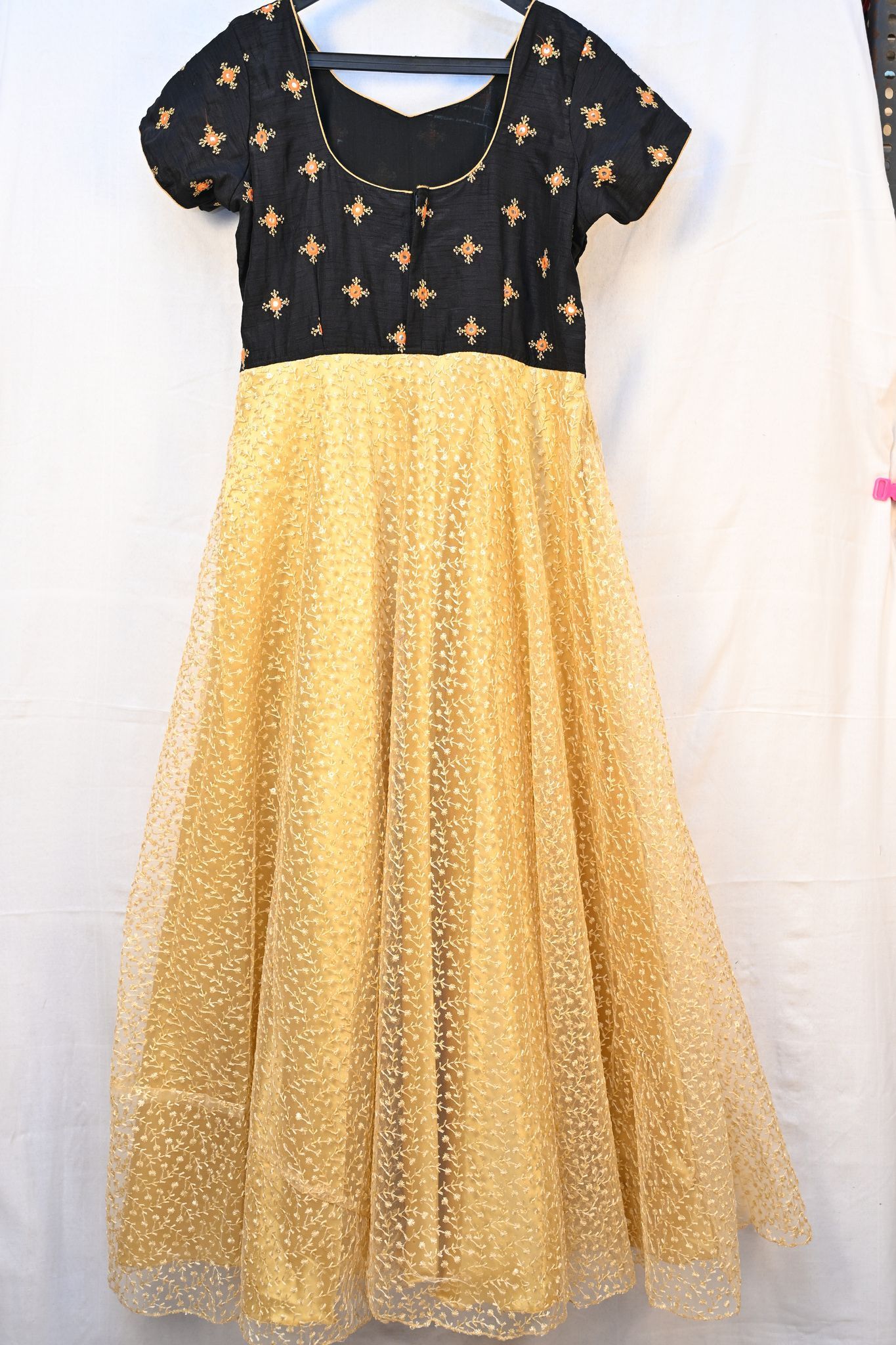 Black and gold embroidered net gown