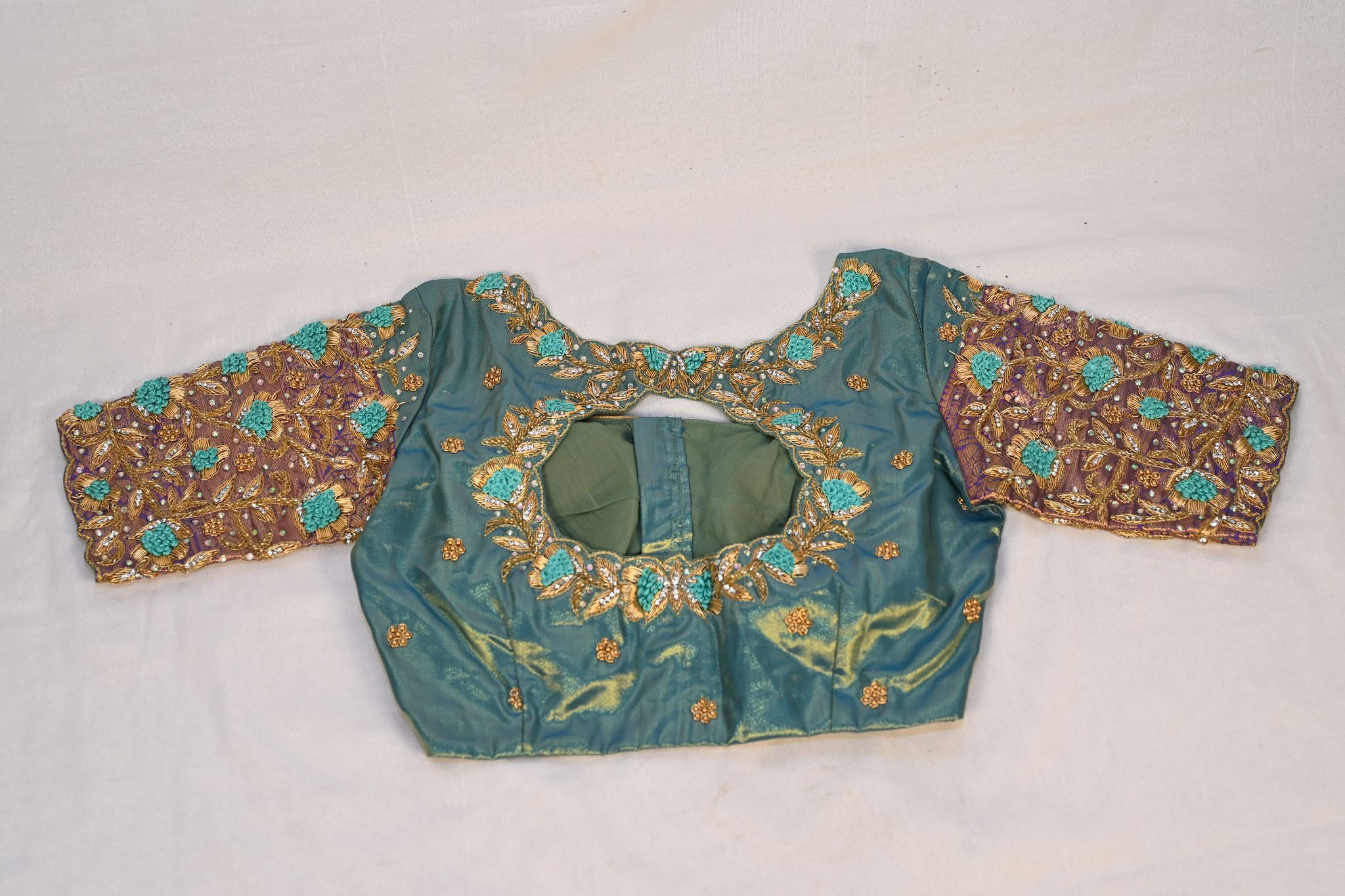 Seafoam green raw silk embroidered boat neck blouse
