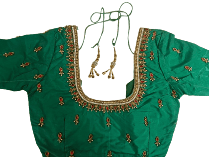 Green blouse with intricate zari and stone embroidery