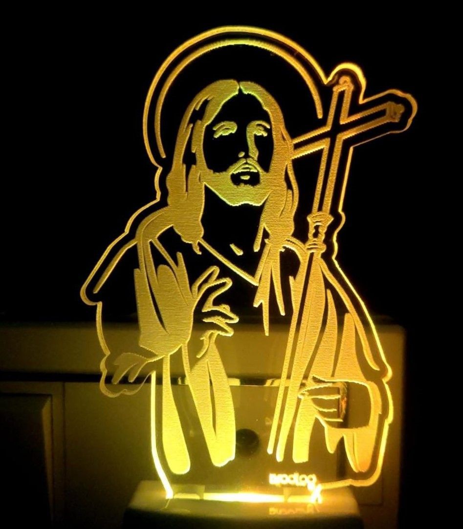 "Illuminate your space with the Holy Presence of Jesus Christ - a radiant 3D illusion night light."