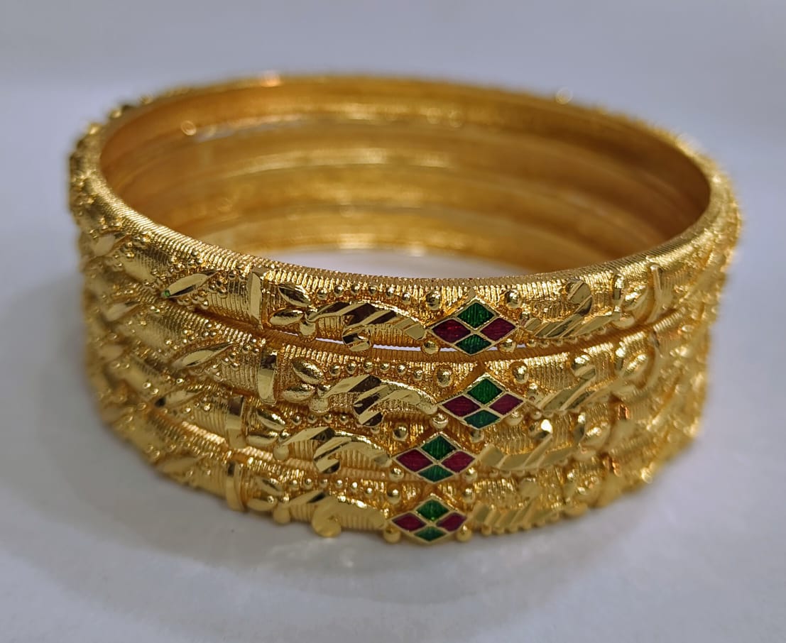 Gold plated Textured Bangle Set with Green and Red Stones