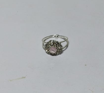 "Elegant Silver-Plated Ring with Pink Center Stone and Rhinestone Accents"