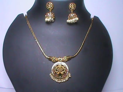 Traditional Indian Gold Plated Laxmi Pendant Set with Earrings Traditional Indian Gold Plated Laxmi Pendant Set with Earrings