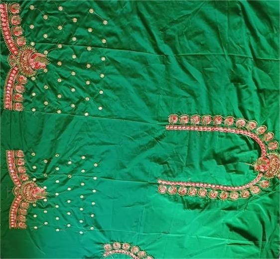 Green blouse with intricate embroidery