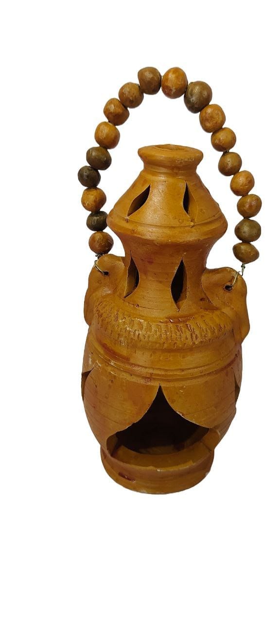 Handmade clay diya with intricate detailing and wooden beads for hanging