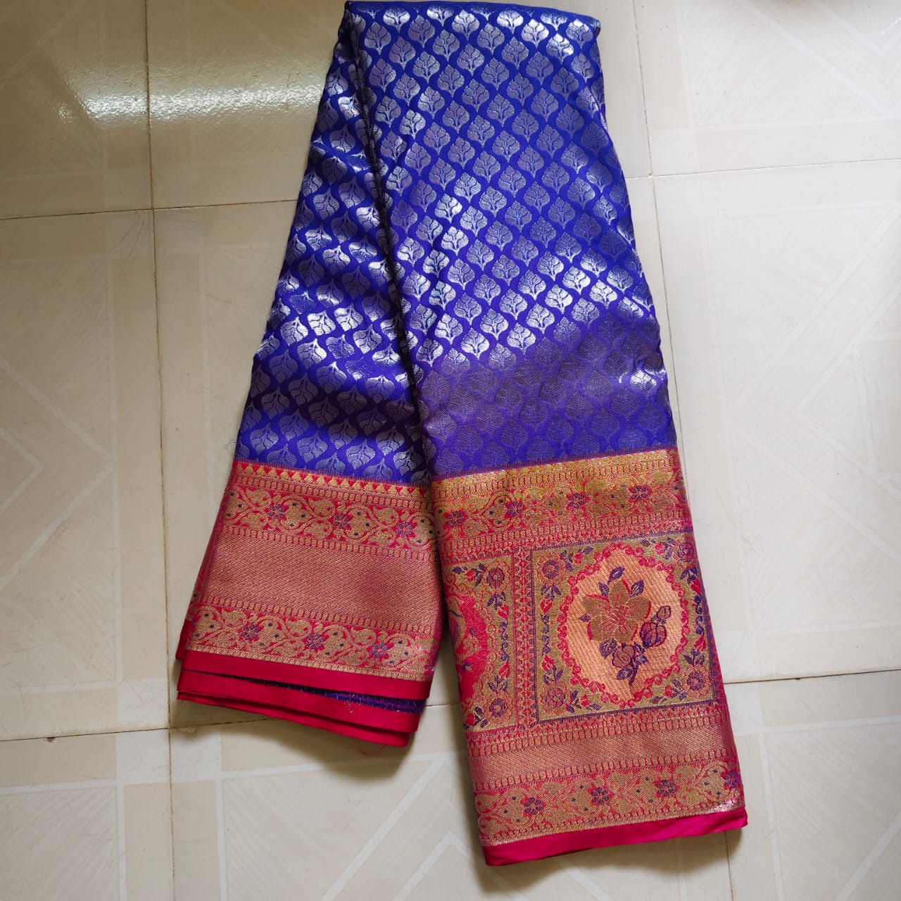 Blue Saree With Silver Zari Work And Pink Border