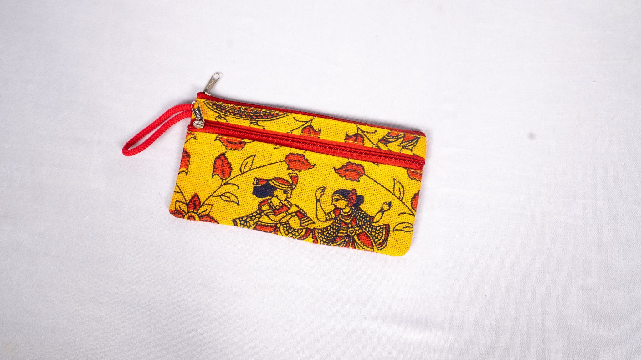 Handmade cotton ikat coin purse with zipper closure