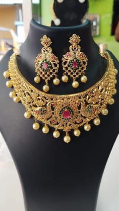 Stunning Kundan and Pearl Choker Necklace Set with Peacock Motif in Gold Plating