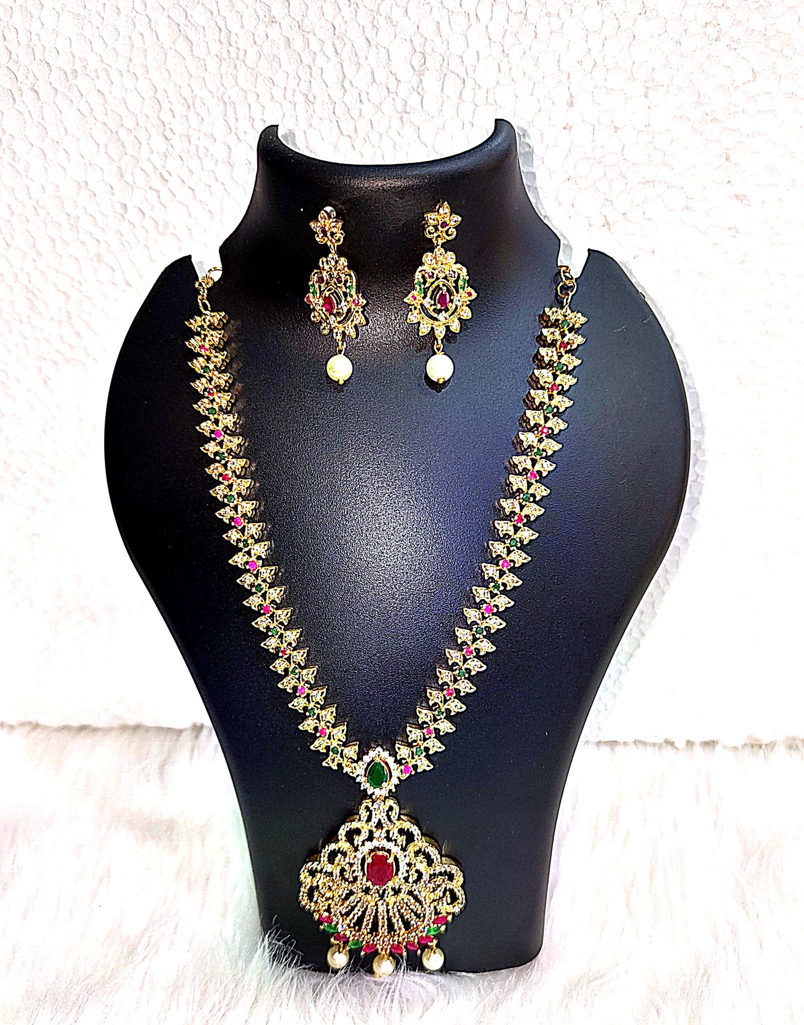 Gold-plated traditional haram necklace set with ruby and emerald stones