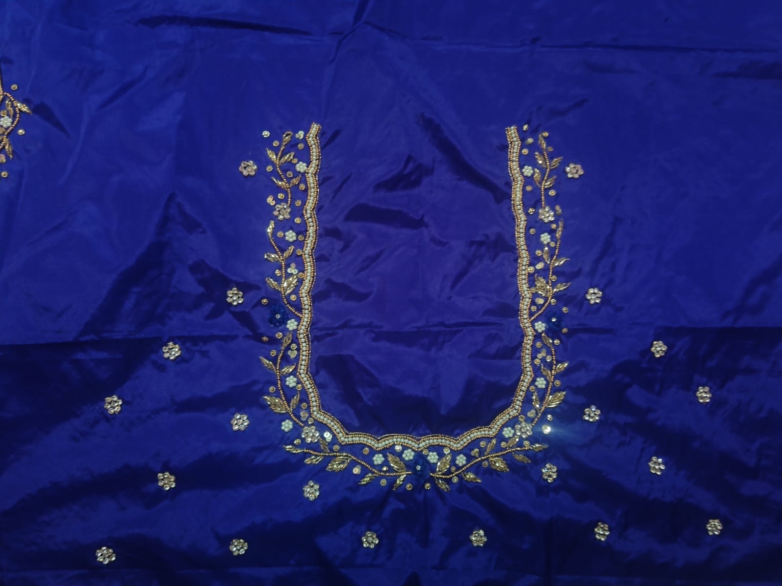 Blue Hand Embroidered Blouse Neck Design With Zari And Stone Work