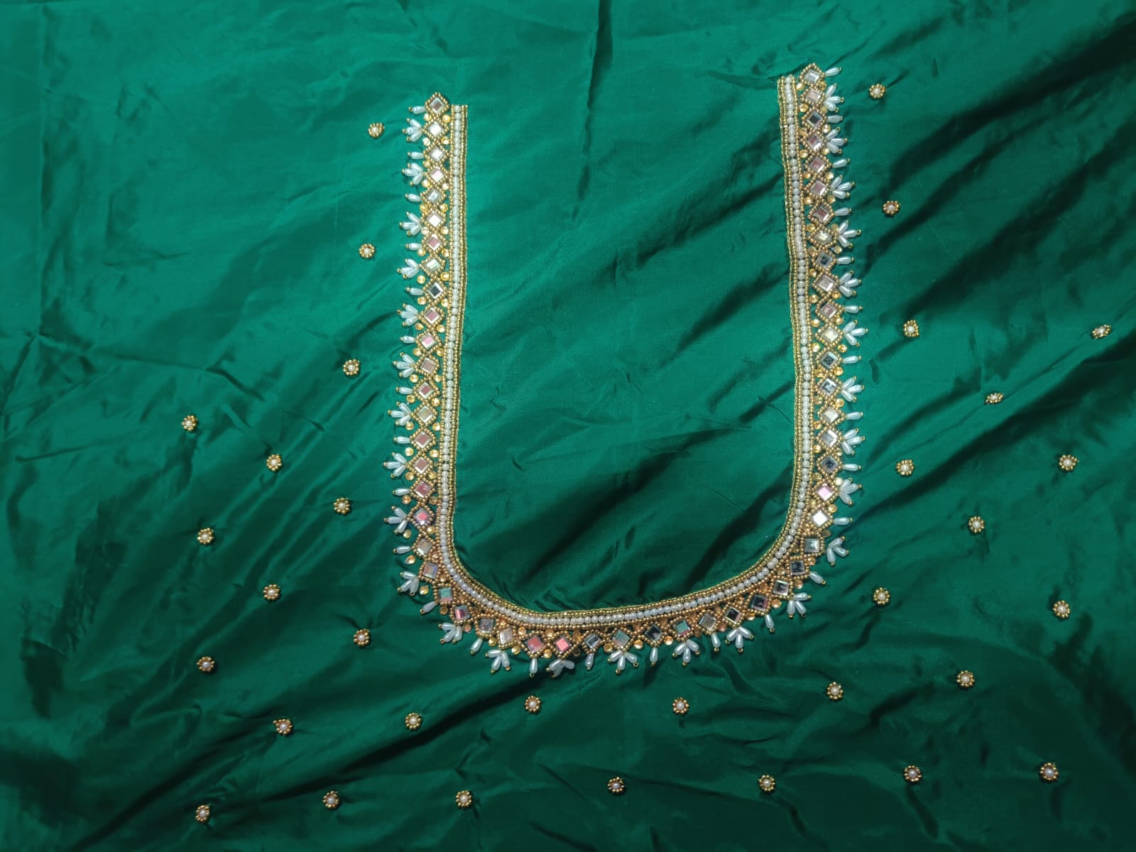 Green blouse with mirror and pearl embroidery Maggam work