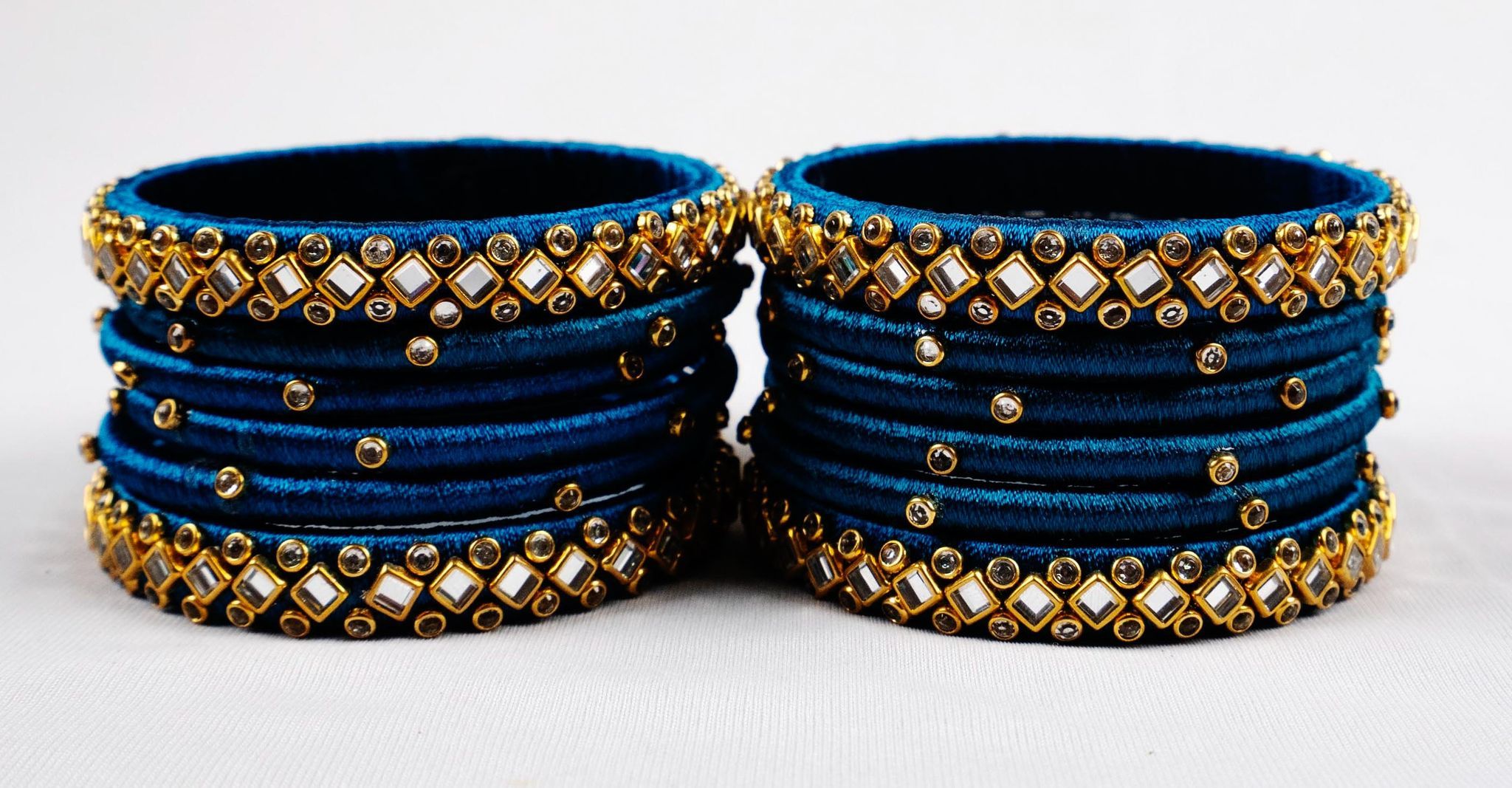 Set of 16 Designer Silk Thread Bangles with Kundan Stones in Peacock Blue