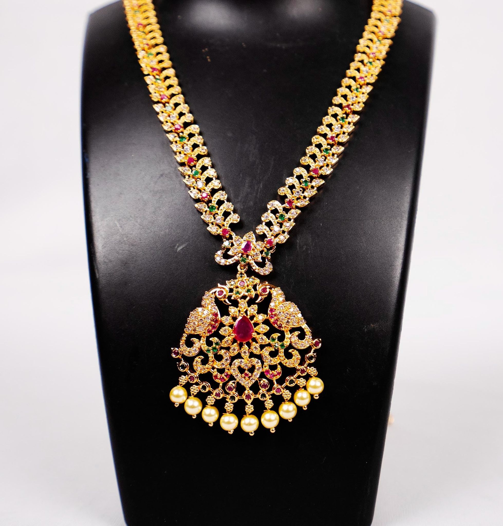Stunning antique gold plated mango haram with rubies and emeralds