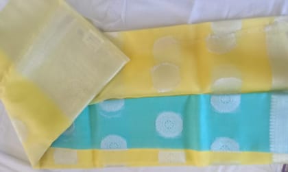 Light Yellow And Light Blue Color Tissue Silk Saree With Silver Zari Weaving Work Light Yellow And Light Blue Color Tissue Silk Saree With Silver Zari Weaving Work