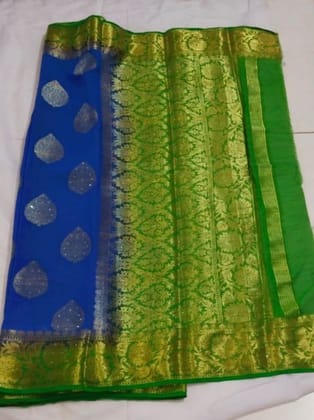 Blue Saree With Silver Zari Work And Green Border Blue Saree With Silver Zari Work And Green Border