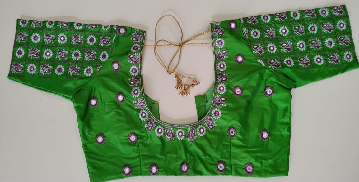 Green blouse with mirror work embroidery