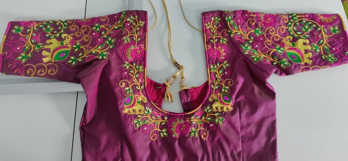 Blouse with intricate zari and elephant embroidery