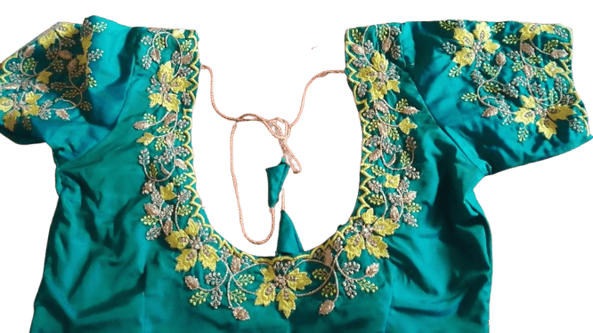 Green blouse with intricate embroidery