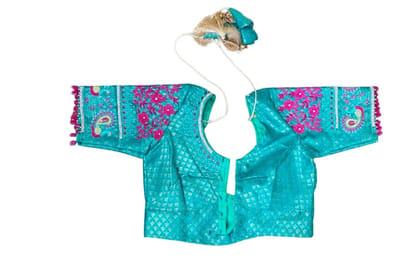 SUDHA EMBROIDERY AND MAGGAM WORKS - Teal Blue Embroidered Peacock Blouse with Pink Floral Accents SUDHA EMBROIDERY AND MAGGAM WORKS - Teal Blue Embroidered Peacock Blouse with Pink Floral Accents