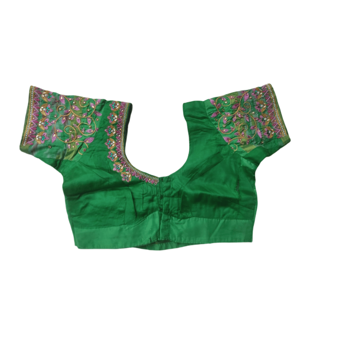 Green blouse with intricate embroidery
