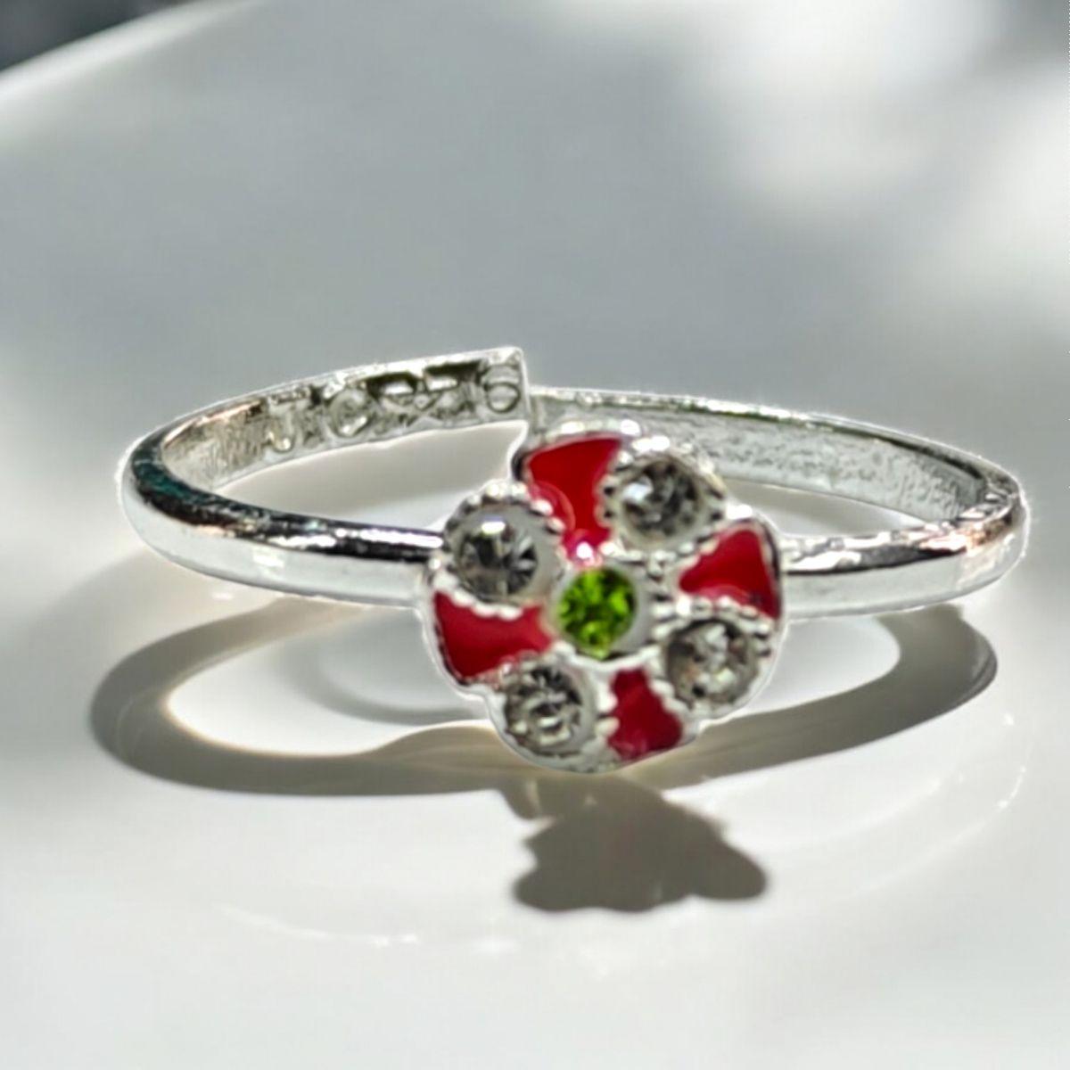 Silver Flower Toe Ring with Green Center Stone and Cubic Zirconia Accents