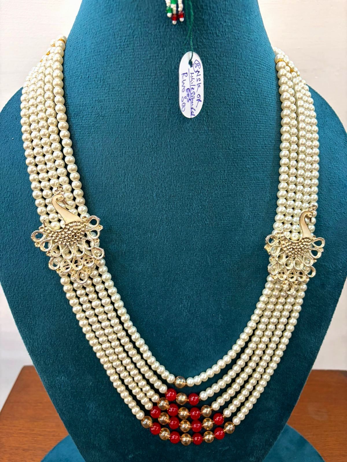 royal peacock theme dulha haar with red and gold bead center spacing