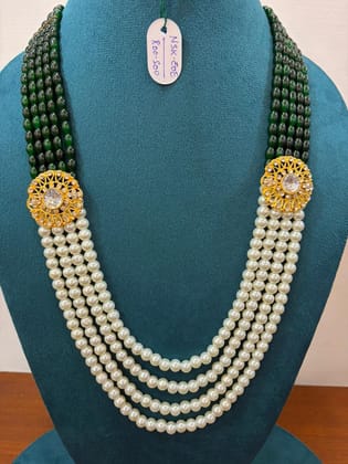 four-layer green and white moti pearl neckalce with gold round brooches