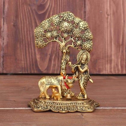 DreamKraft Metal Krishna With Cow Standing Under Tree Plying Flute (Gold, 12.5X8X16 cm)