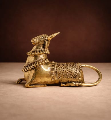 Handcrafted Brass Sitting Nandi Idol – Traditional Bhareva Bell Metal Sacred Bull Show piece Handcrafted Brass Sitting Nandi Idol – Traditional Bhareva Bell Metal Sacred Bull Show piece