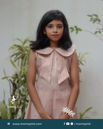 Blush Elegance: Rose gold sleeveless trendy frock with peter pan collar Blush Elegance: Rose gold sleeveless trendy frock with peter pan collar