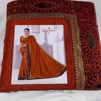 Beautiful ? Saree rust-orange with a dark red border and pallu.