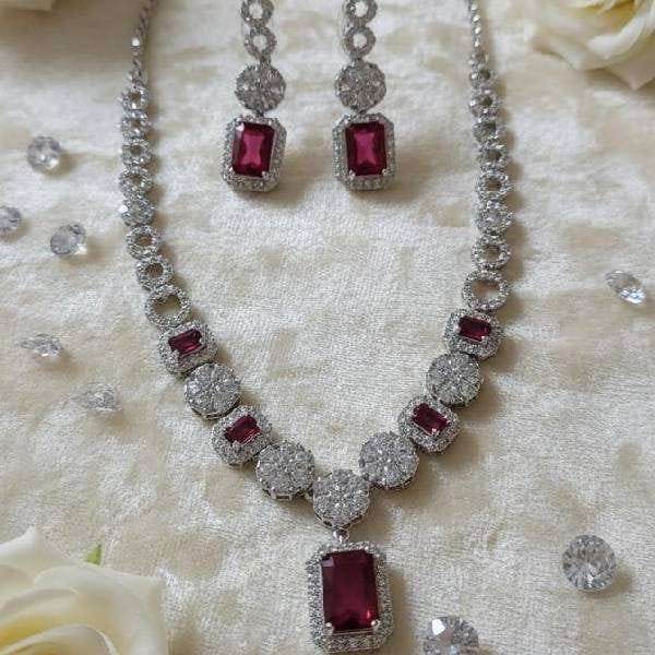 AD Emerald-Cut Pink Sapphire or Cubic Zirconia Halo Necklace and Earring Set.