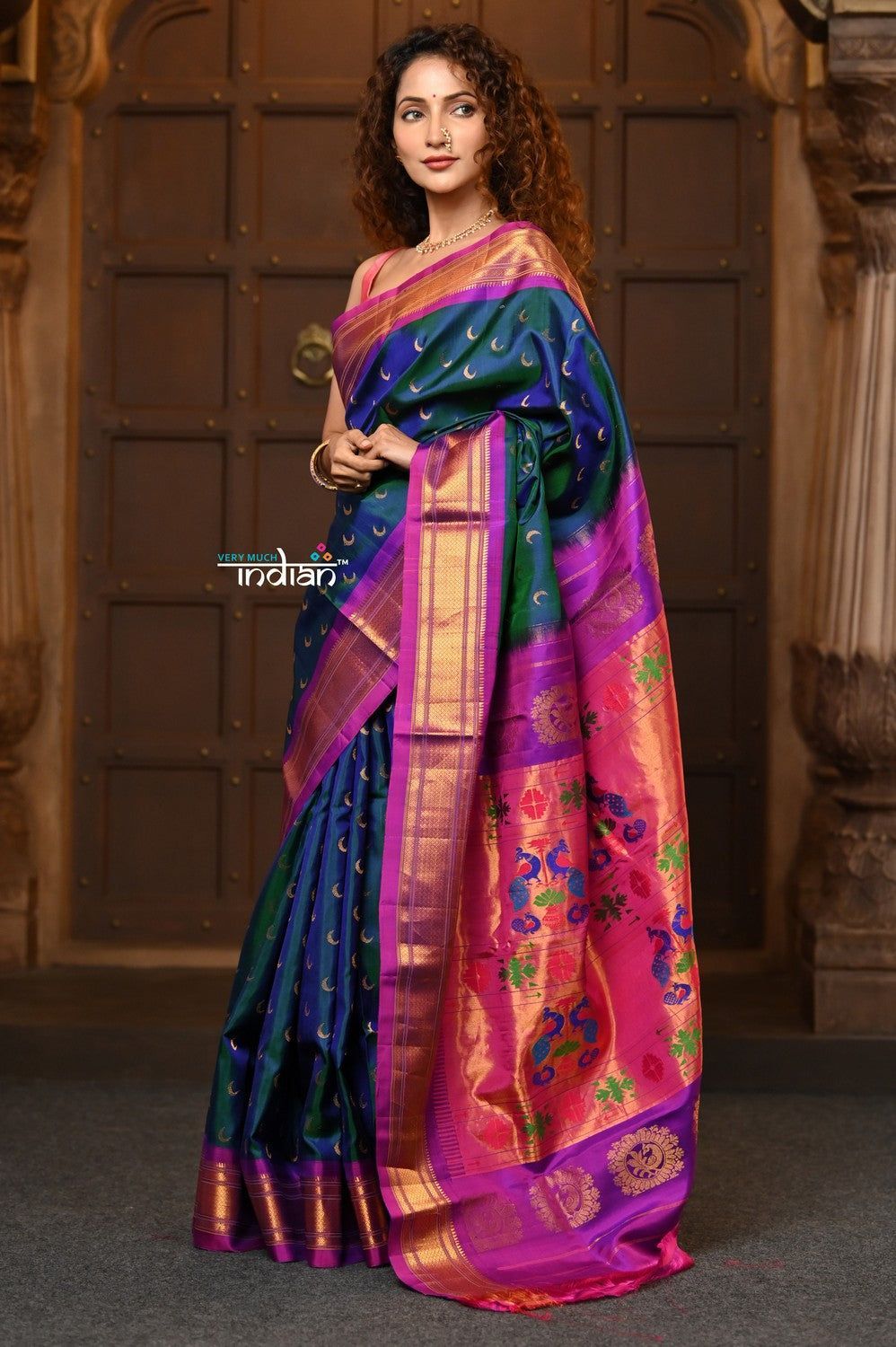 Chandrakor ~ Handloom Pure Silk Maharani Paithani with Majestic Maharani Pallu in Peacock Blue