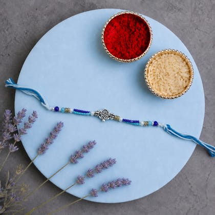 Silver Turtle Charm Beaded Rakhi Silver Turtle Charm Beaded Rakhi