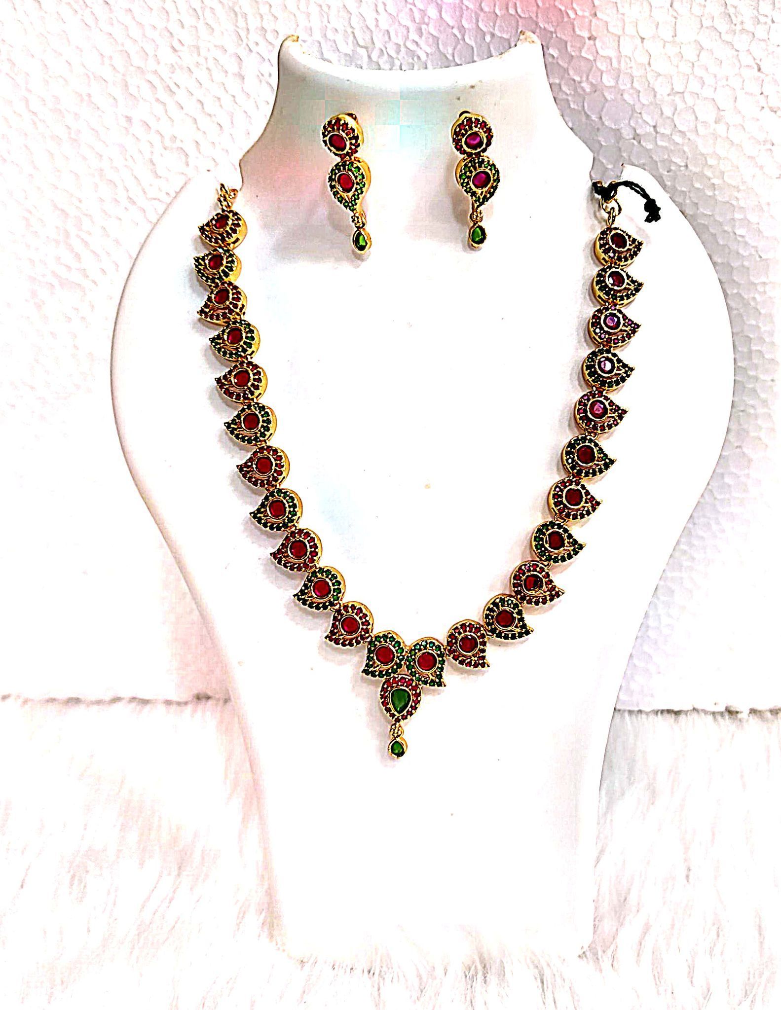 Gold-plated traditional Indian necklace set with rubies and emeralds