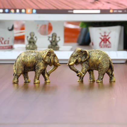 Dreamkraft Gold Elephant Decorative Figurine Set - 2 Pcs Metal Showpiece - Antique Finish for Home, Office & Vastu Decor - Handcrafted Aluminium (9.5L x 4W x 7H CM) Dreamkraft Gold Elephant Decorative Figurine Set - 2 Pcs Metal Showpiece - Antique Finish for Home, Office & Vastu Decor - Handcrafted Aluminium (9.5L x 4W x 7H CM)