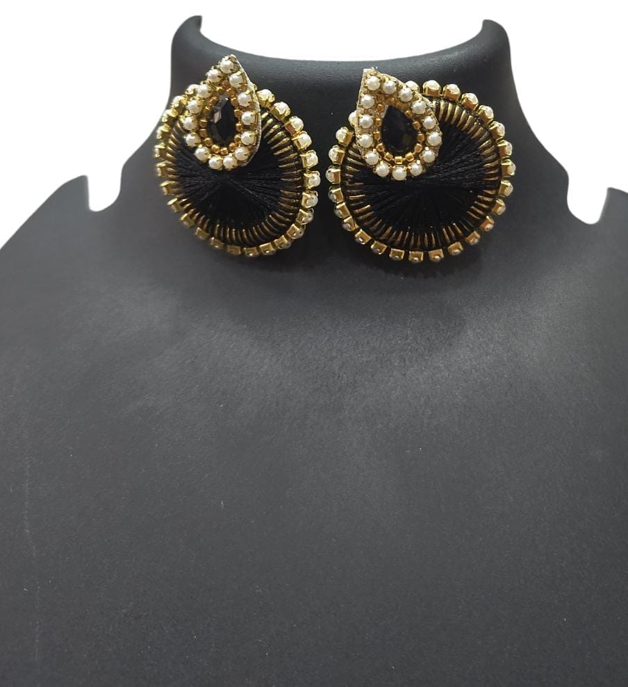Black and gold round stud earrings with pearl and thread detailing