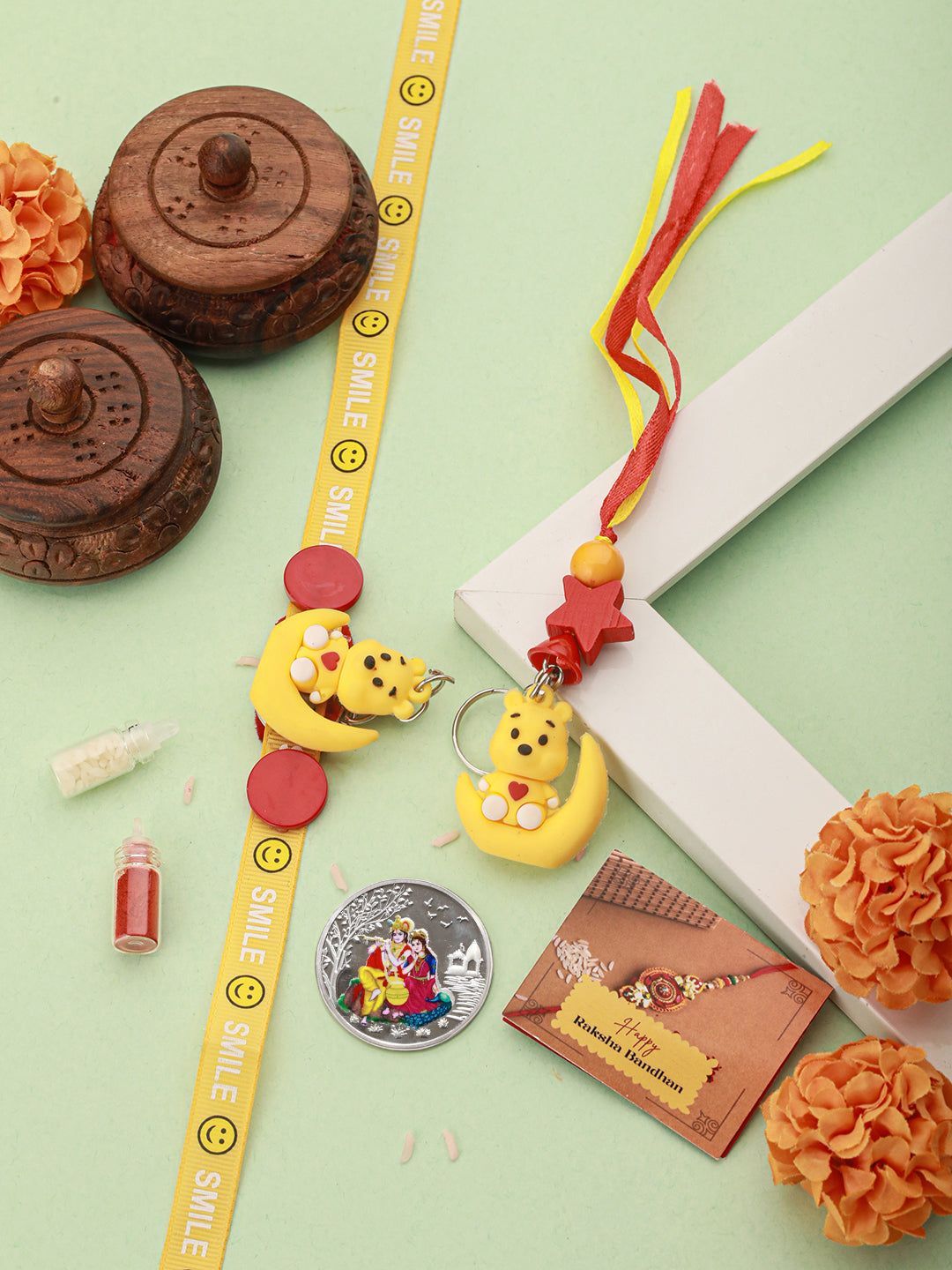 Set Of 2 Winnie The Pooh Key Chain Kids Toy Rakhi With Enchanting Radha Krishna 10 gram  999 Silver Coin