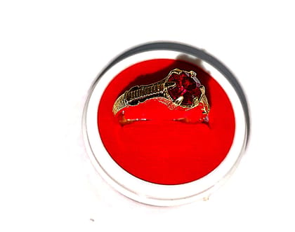 "Stunning Gold Ring with Red Gemstone"