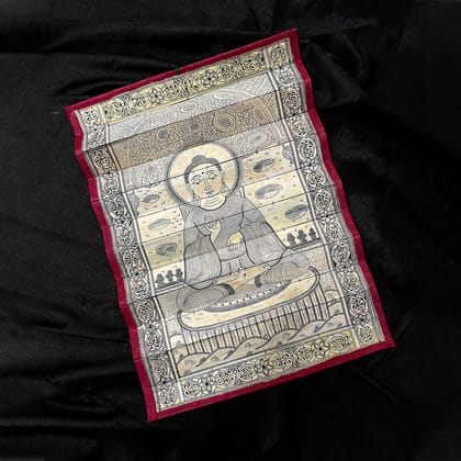 Palm leaf engraving of meditating Buddha