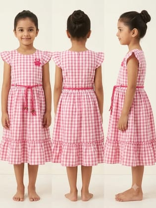 The frock is in a blue and white check design.