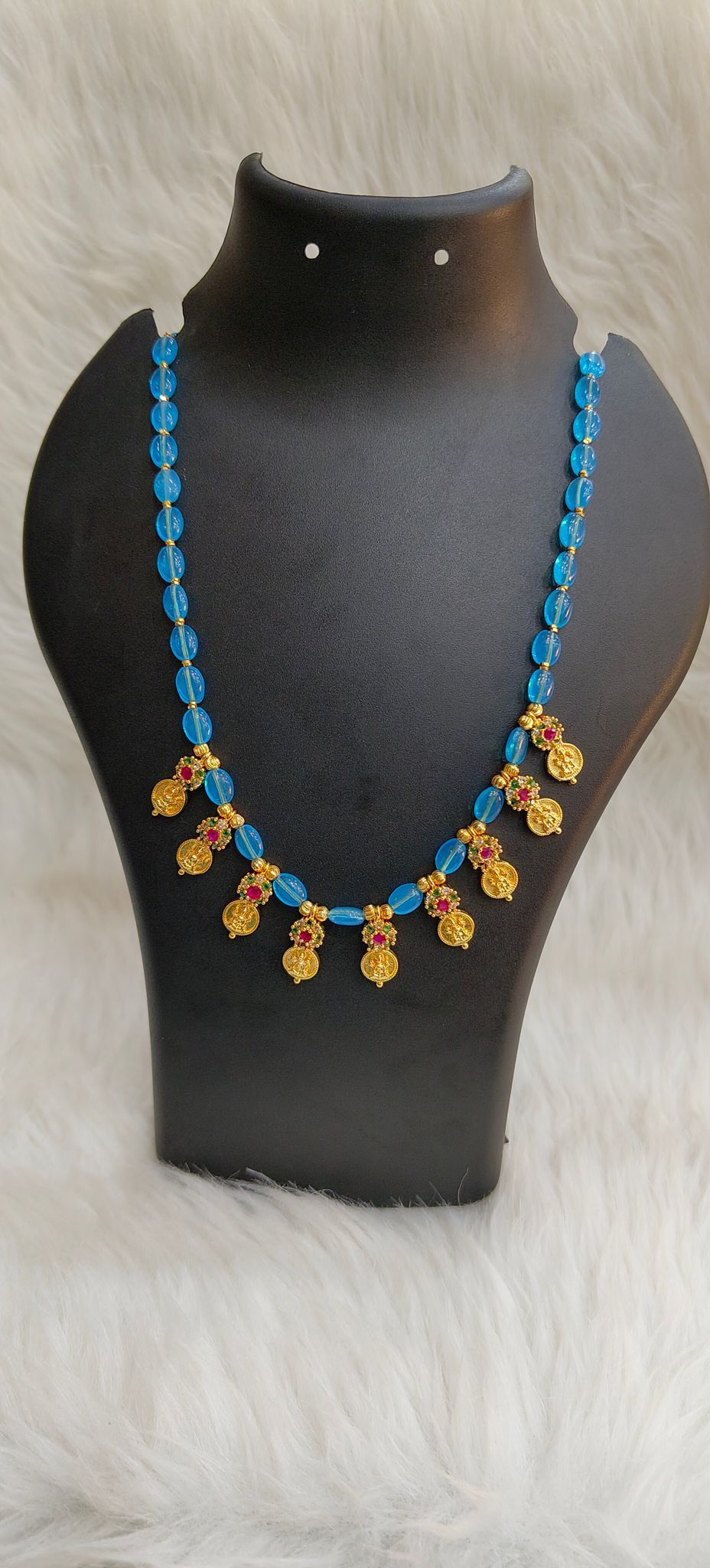 "Stunning Blue Beaded Necklace with Gold-Plated Pendants"