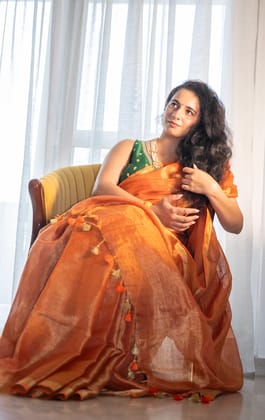 Bhor - Metallic Orange Tissue Silk Saree with Gold Border