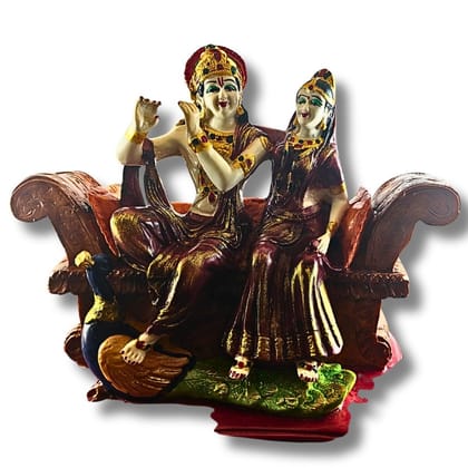 Radha Krishna Idol on Sofa with Peacock – Premium Handcrafted Divine Couple Murti (Red &amp; Pink Variants) for Home Décor, Mandir &amp; Spiritual Gifting by Saadhya Decors